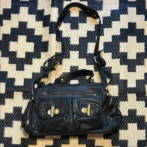 Kenneth Cole Black Leather Handbag with Gold Accents - Picture 1 of 4